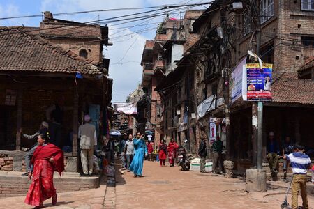 BHAKTAPUR,NEPAL-April 2015: view of people in town at Bhaktapur Durbar square before earthquake in April 2015のeditorial素材