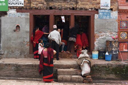 BHAKTAPUR,NEPAL-April 2015: view of people in town at Bhaktapur Durbar square before earthquake in April 2015のeditorial素材