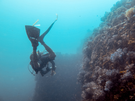 the diver is diving in the sea, Myanmarの写真素材