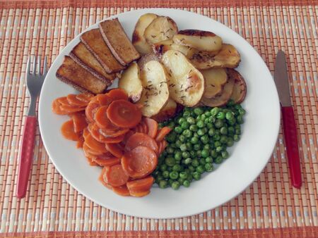 Baked potatoes with vegetableの写真素材