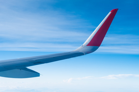 wing air and blue skyの写真素材