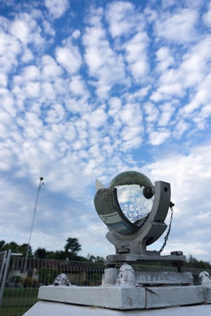 Campbel stoke or sunshine duration meter is a meteorology tools under the bright blue sky with at Ngurah Rai Bali International Airportのeditorial素材