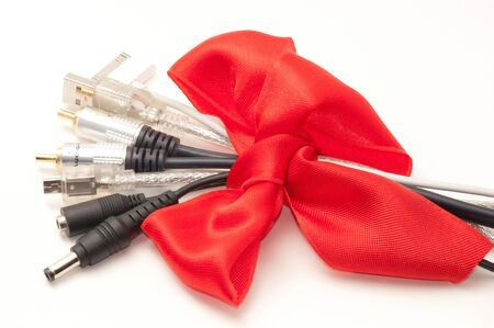 Funny bunch of plugs with red bow.の写真素材