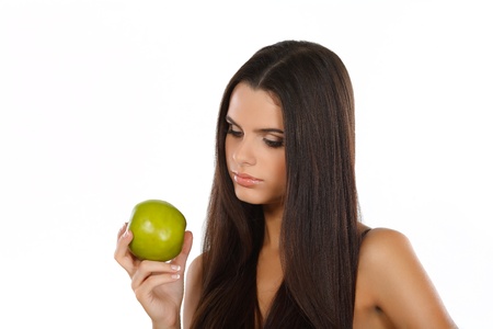 girl with a green apple, emotionsの写真素材
