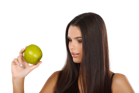 girl with a green apple, emotionsの写真素材