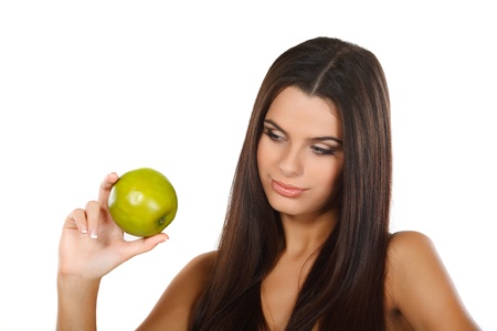 girl with a green apple, emotionsの写真素材