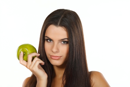 girl with a green apple, emotionsの写真素材