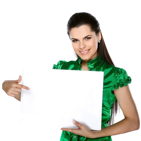 young, beautiful brunette holds a bannerの写真素材