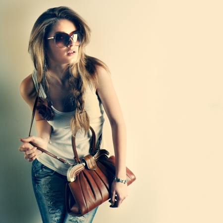 A photo of beautiful girl is in fashion styleの写真素材