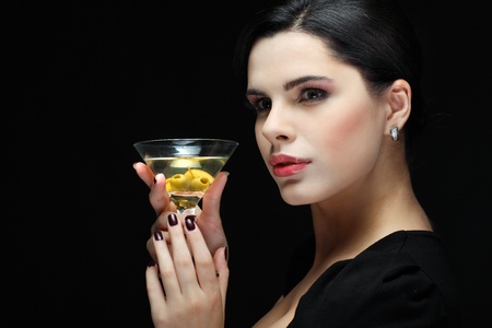 beautiful young girl  with  glass of martiniの写真素材