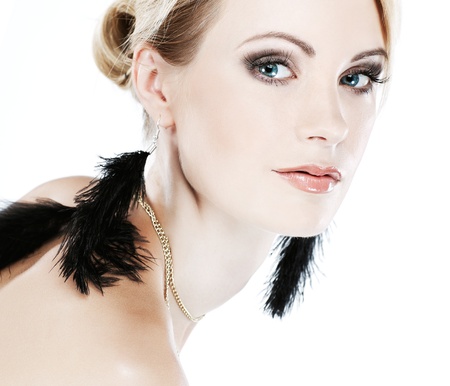 Closeup portrait of sexy whiteheaded young woman with beautiful blue eyes on white backgroundの写真素材