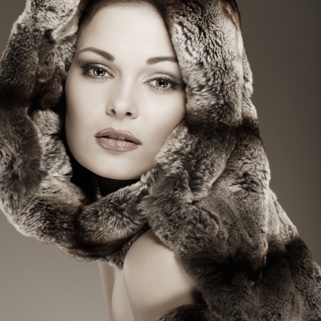 A photo of sexual beautiful girl is in fur clothesの写真素材