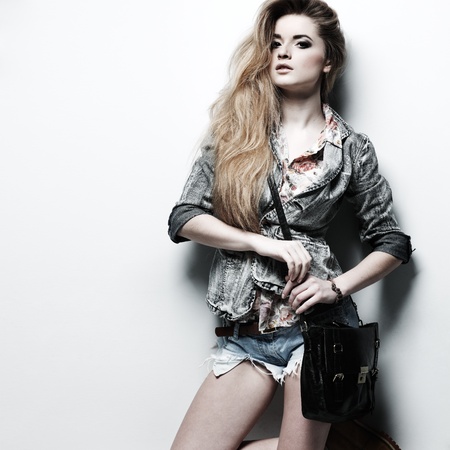 A   beautiful girl is in fashion style  の写真素材