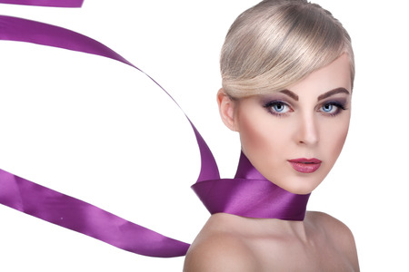 Closeup portrait of sexy  young woman with beautiful blue eyes on white backgroundの写真素材