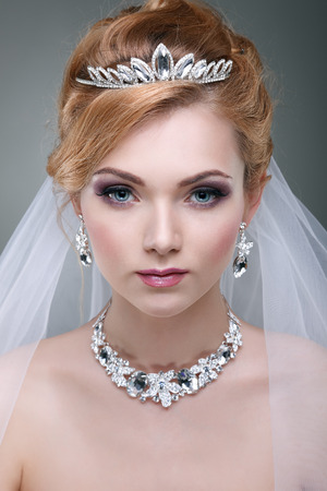 A photo of sexual beautiful girl in a wedding-dress is in fashion style. Wedding decorationsの写真素材