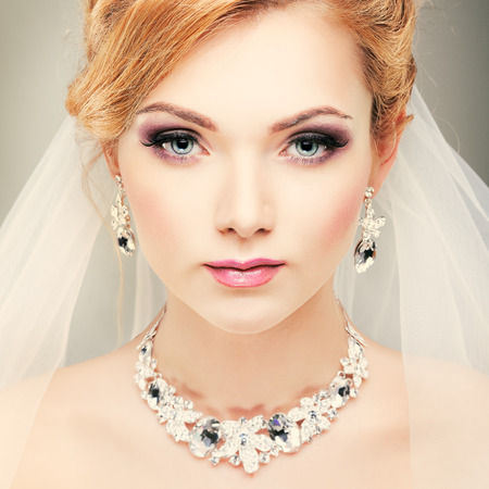 A photo of sexual beautiful girl in a wedding-dress is in fashion style. Wedding decorationsの写真素材