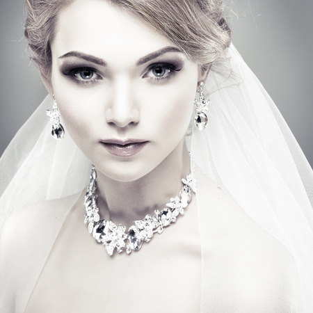 A photo of sexual beautiful girl in a wedding-dress is in fashion style. Wedding decorationsの写真素材