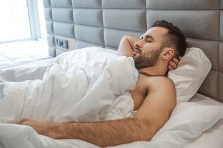 Bachelor man daily routine single lifestyle morning concept dreamingの写真素材