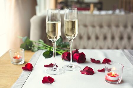 Dining table in restaurant isolated close-up champagne glassesの写真素材