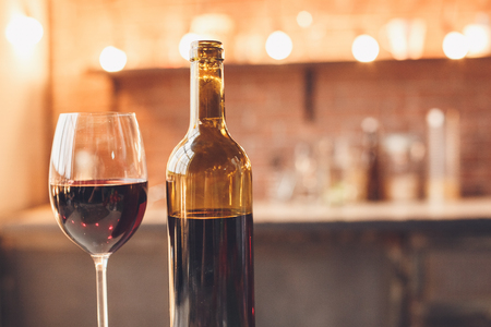 Minimalism, perfect. Luxury alcohol, glass red wine. Indoor, kitchen home interior, studio shot.の写真素材