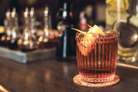 Cocktail isolated on bar counter side viewの写真素材