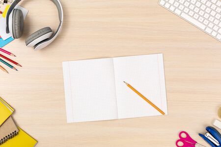 Workspace. Desk top view no people notebook and lead pencilの写真素材