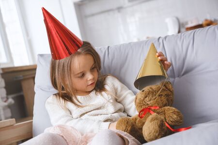 Little kid girl at home childhood concept birthday celebrationの写真素材