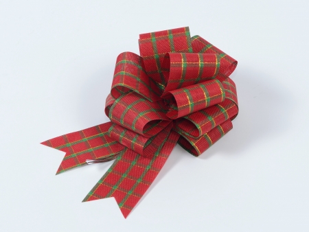 Red and green plaid bow pattern on a white background の写真素材