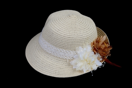 White weave hat on black background.の写真素材