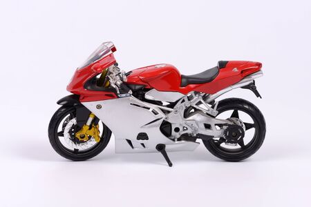 Red motorcycle model on white background の写真素材