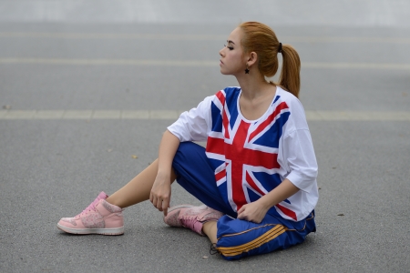 Hip hop girl on street.の写真素材