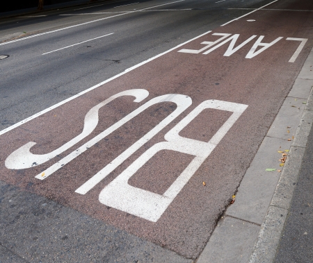 The sign show that this lane on the street only for bus.の写真素材