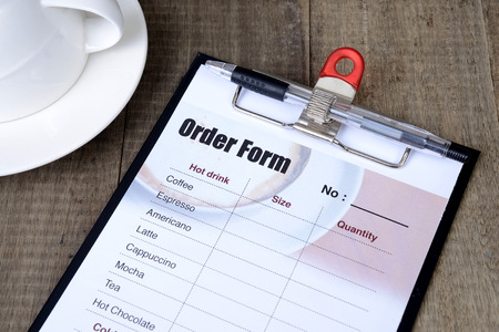 Drink list in order form on clipboard.の写真素材