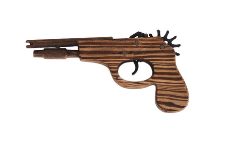 Retro toy gun made by wooden on white background.の写真素材