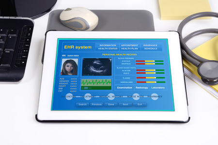 Electronic medical record show patient's health information on tablet.の写真素材