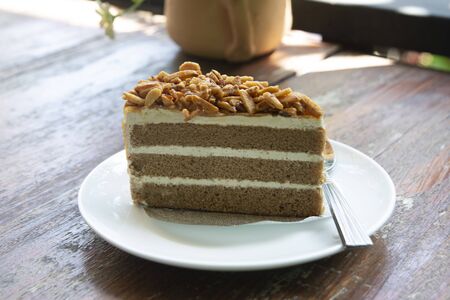 Almond coffee cake served on dish.