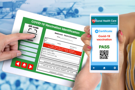 Someone using QR code scan application checking  vaccination e-certificate.の写真素材