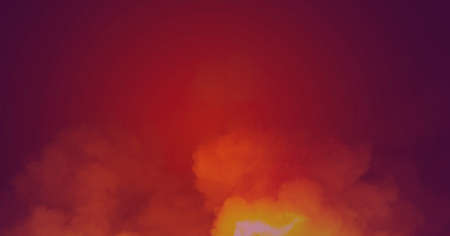 Background picture of smoke from fire rising above made surrounding area red and terrifying.の写真素材