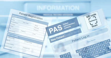 PAS or Patient administration system screen and blank medical record form showing on blue tone of...