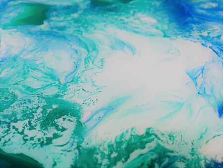 Close Up Colorful Blue Green White Fluid Pouring Abstract Art Acrylic Painting Texture Backgroundの写真素材