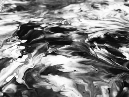 Close Up Black And White Colors Fluid Pouring Abstract Art Acrylic Painting Texture Backgroundの写真素材