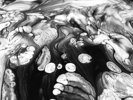 Close Up Black And White Colors Fluid Pouring Abstract Art Acrylic Painting Texture Backgroundの写真素材