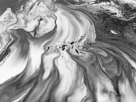 Close Up Black And White Colors Fluid Pouring Abstract Art Acrylic Painting Texture Backgroundの写真素材