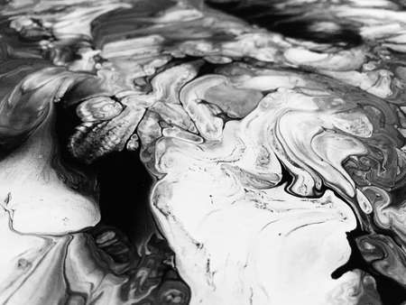 Close Up Black And White Colors Fluid Pouring Abstract Art Acrylic Painting Texture Backgroundの写真素材