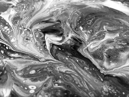 Close Up Black And White Colors Fluid Pouring Abstract Art Acrylic Painting Texture Backgroundの写真素材