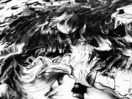 Close Up Black And White Colors Fluid Pouring Abstract Art Acrylic Painting Texture Backgroundの写真素材