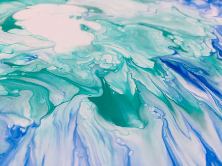 Close Up Colorful Blue Green White Fluid Pouring Abstract Art Acrylic Painting Texture Backgroundの写真素材