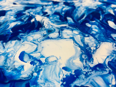 Close Up Colorful Blue and White Fluid Pouring Abstract Art Acrylic Painting Texture Backgroundの写真素材