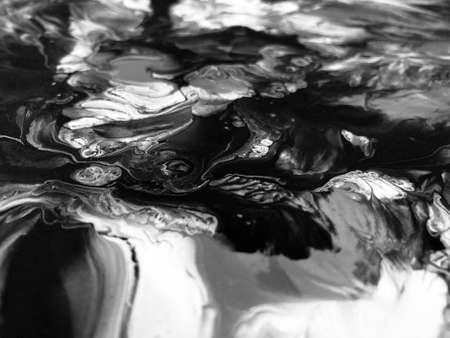 Close Up Black and White Colors Fluid Pouring Abstract Art Acrylic Painting Texture Backgroundの写真素材