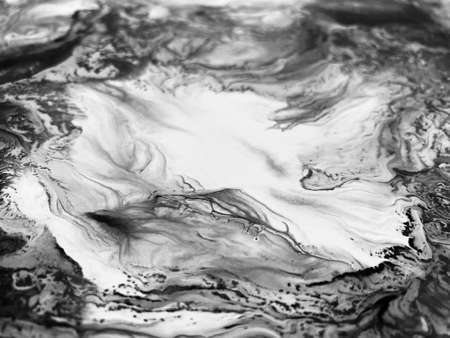 Close Up Black and White Colors Fluid Pouring Abstract Art Acrylic Painting Texture Backgroundの写真素材